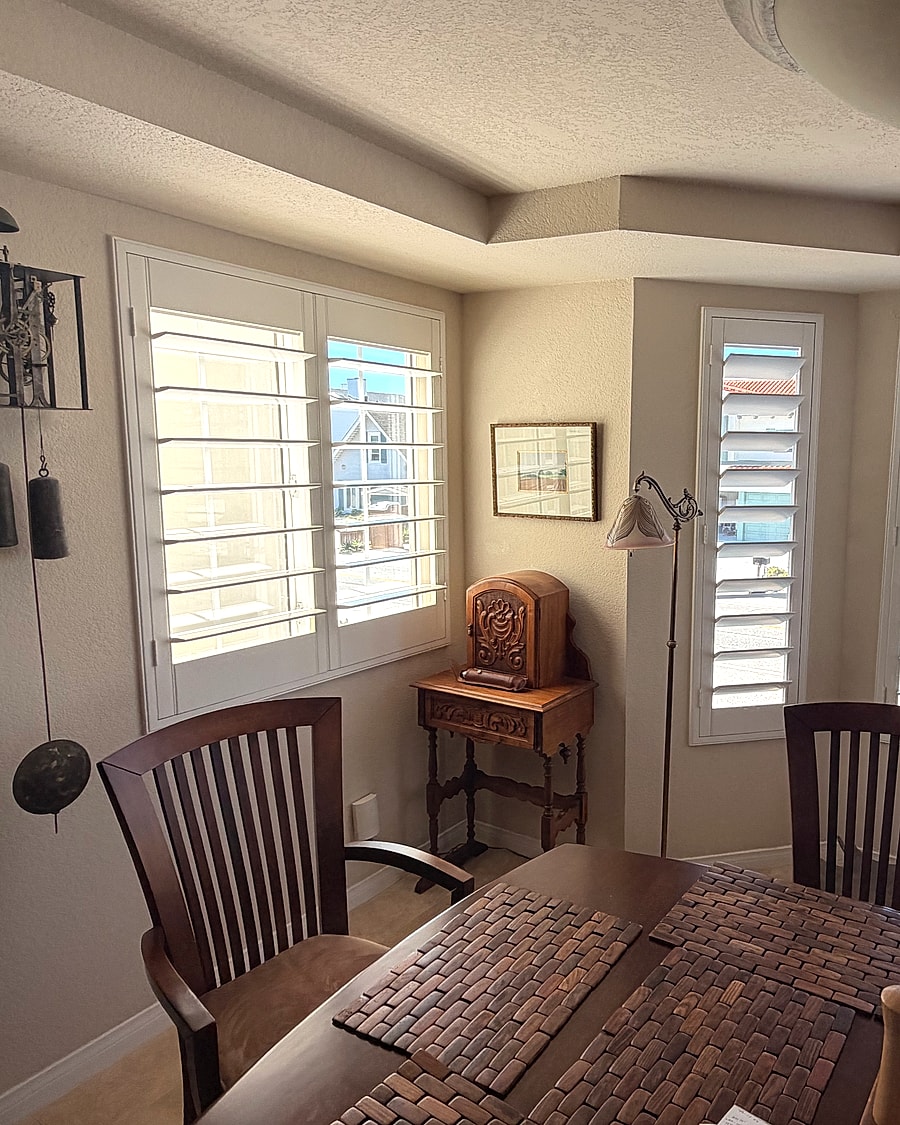 Plantation shutters installed in a dining room