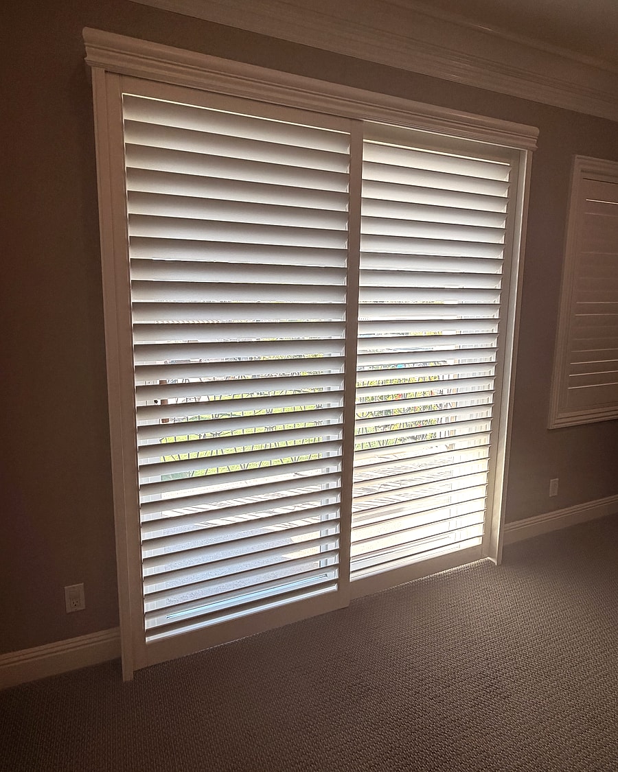 Tall window blinds installed in a Ventura County room